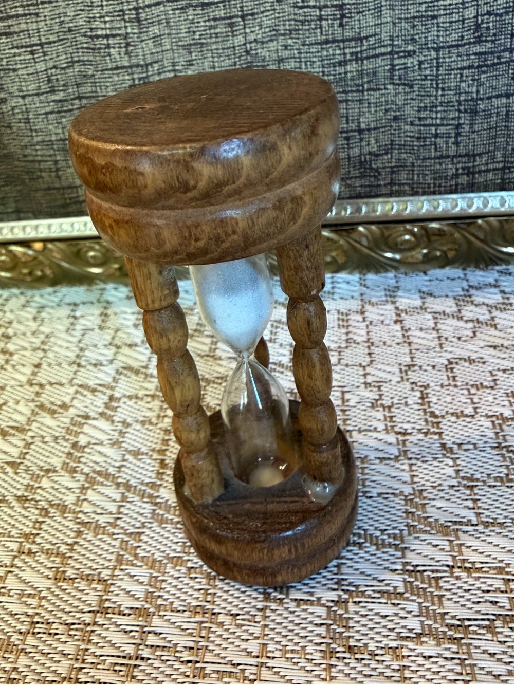 Vintage wood and glass hourglass